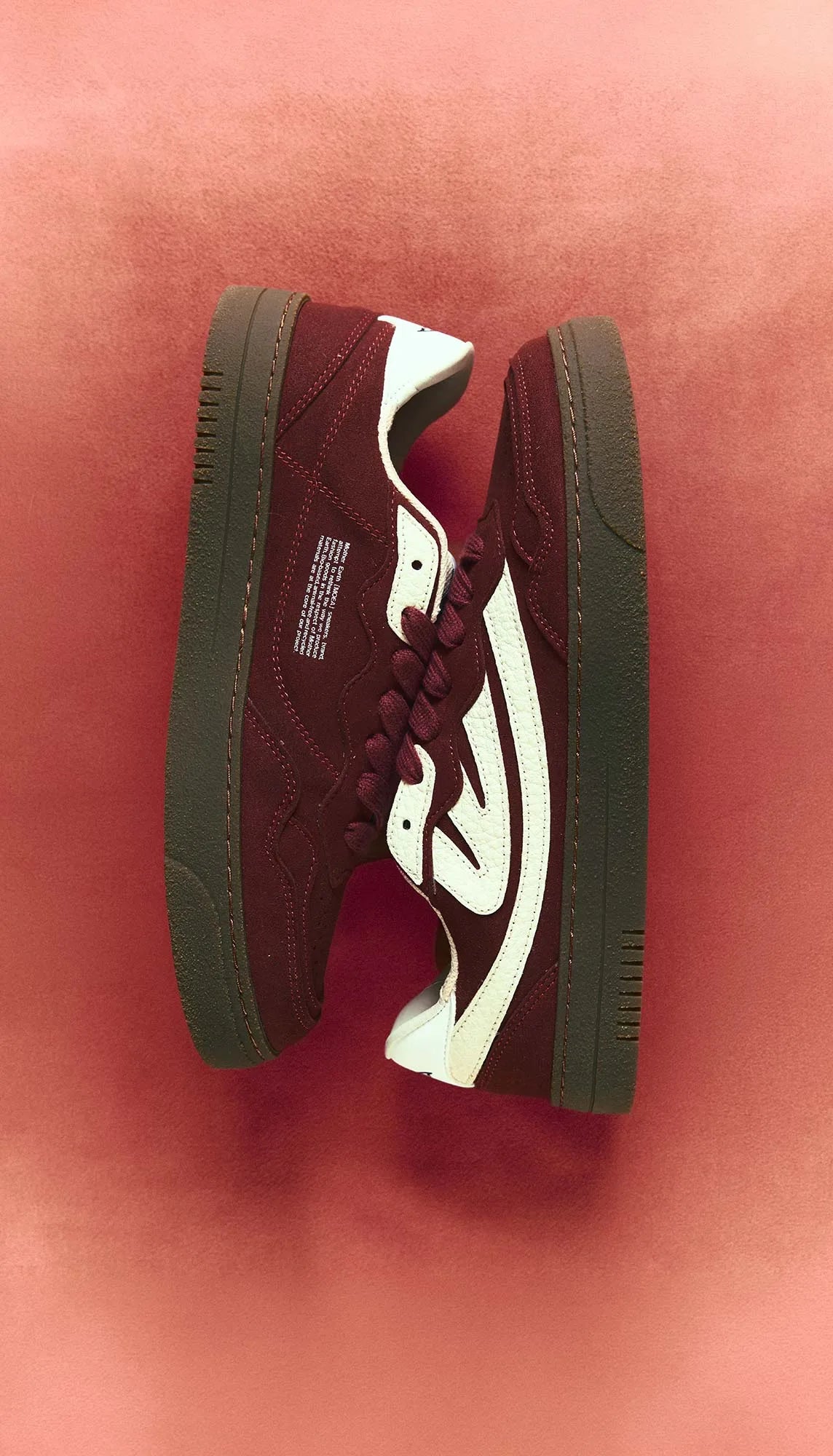 AW26 sneakers on pink velvet